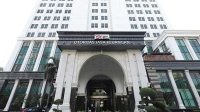 OJK Desak Konsolidasi Bank: Terlalu Banyak, Risiko Tinggi?